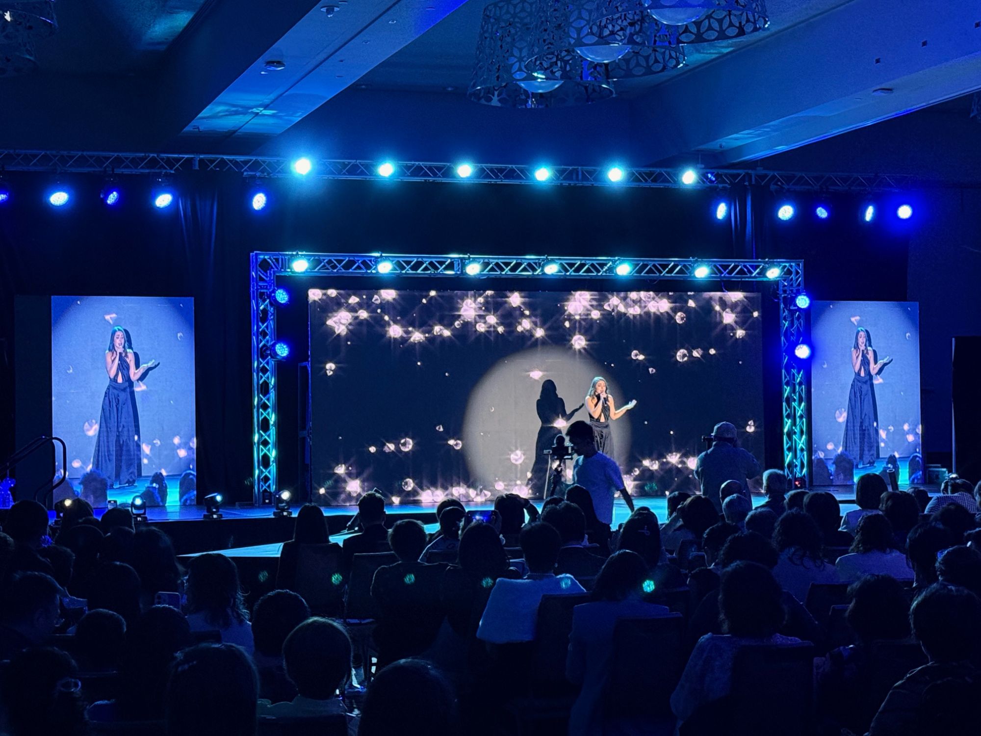 Chinese Canadian Entrepreneur Awards stage with a wide LED backdrop and award recipients